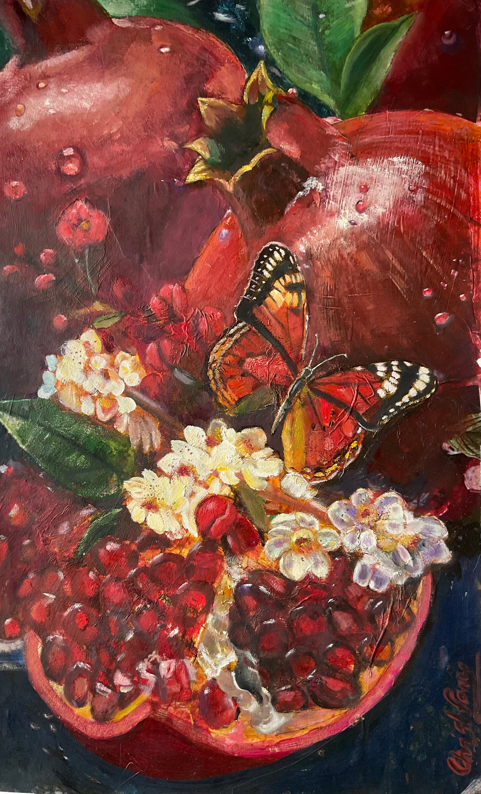 wall art decor of butterfly hovering over pomegranate