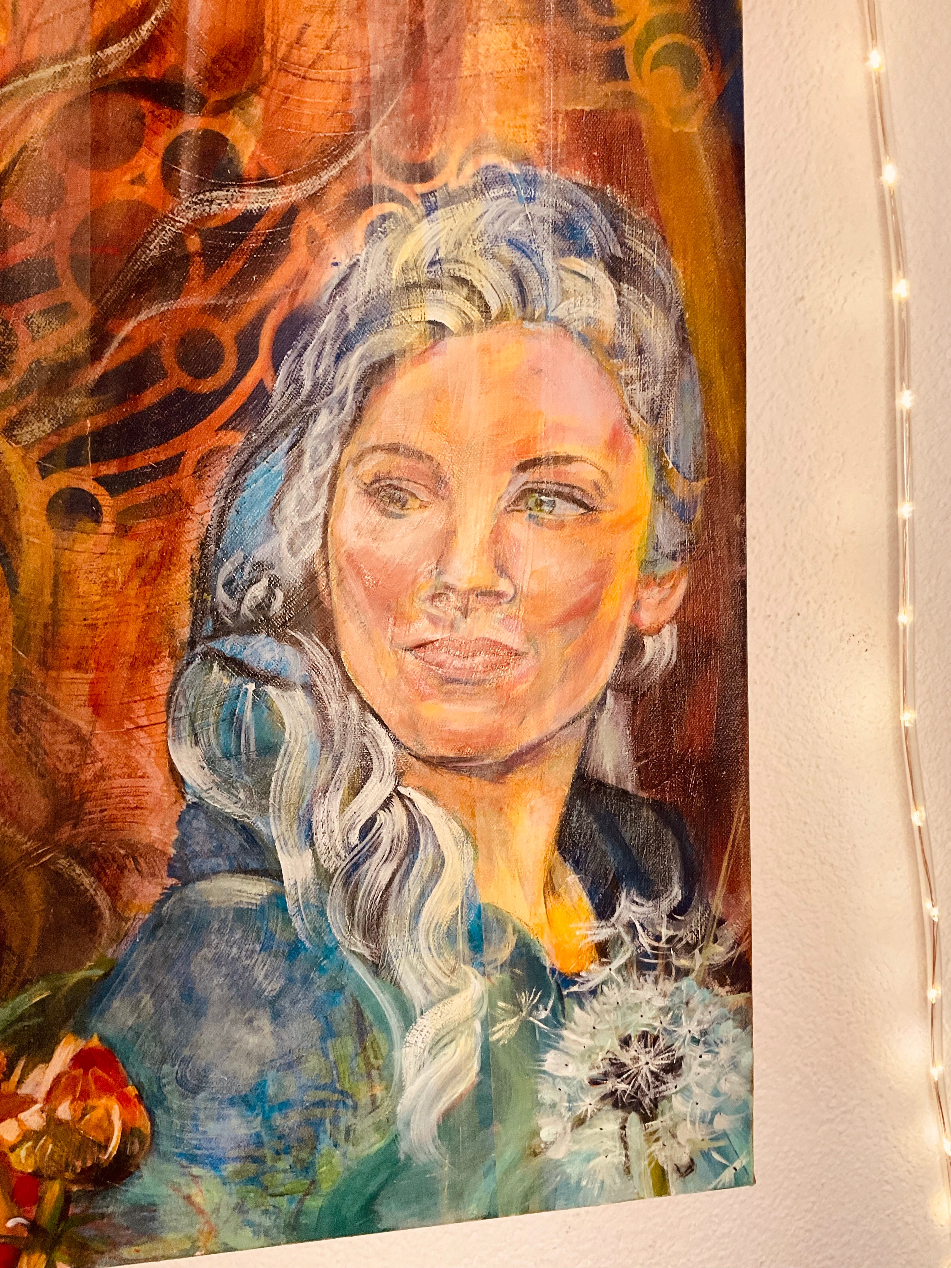 floral canvas wall art of woman behind dandelion